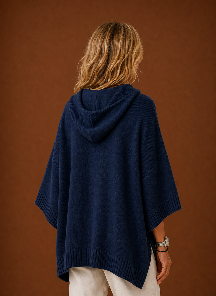 Back view showing hood and straight hem of the pullover