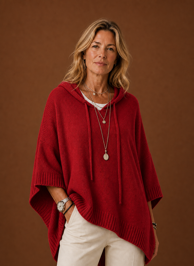 Front view of oversized hooded pullover on mannequin showing hood and relaxed fit