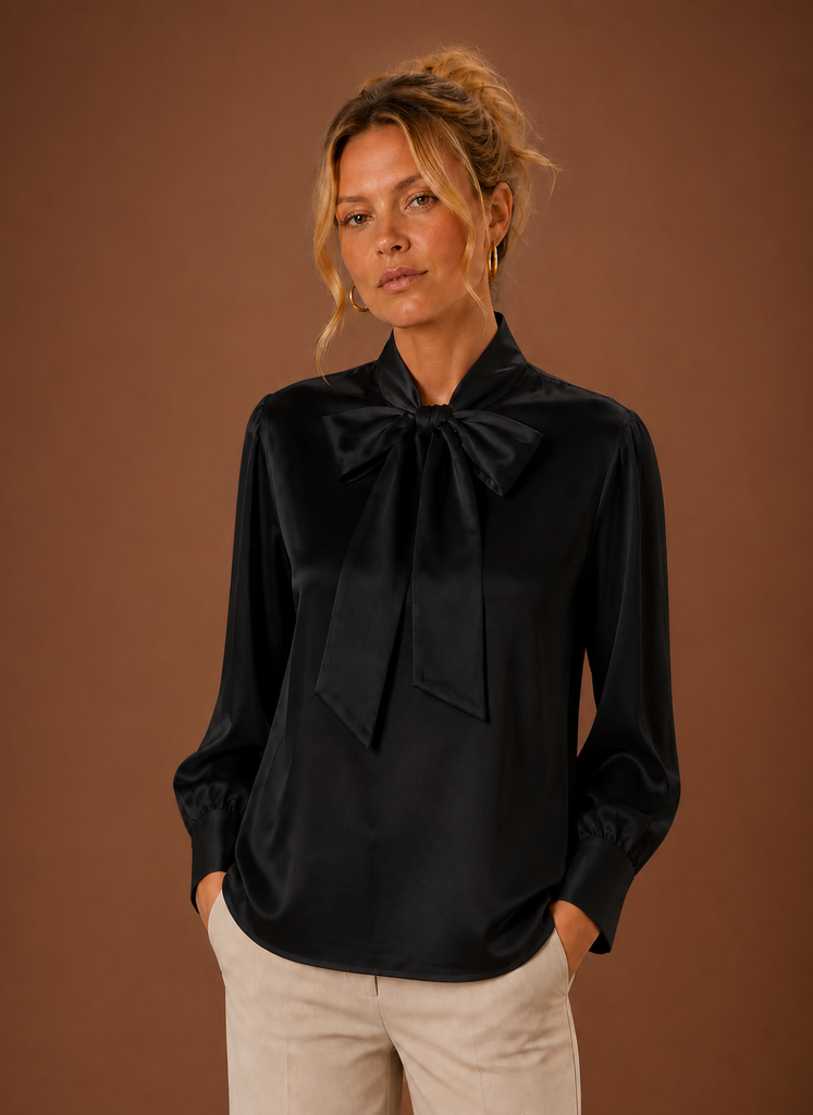 Front view of women's V-neck sweater on a mannequin showing the V-neckline and relaxed silhouette