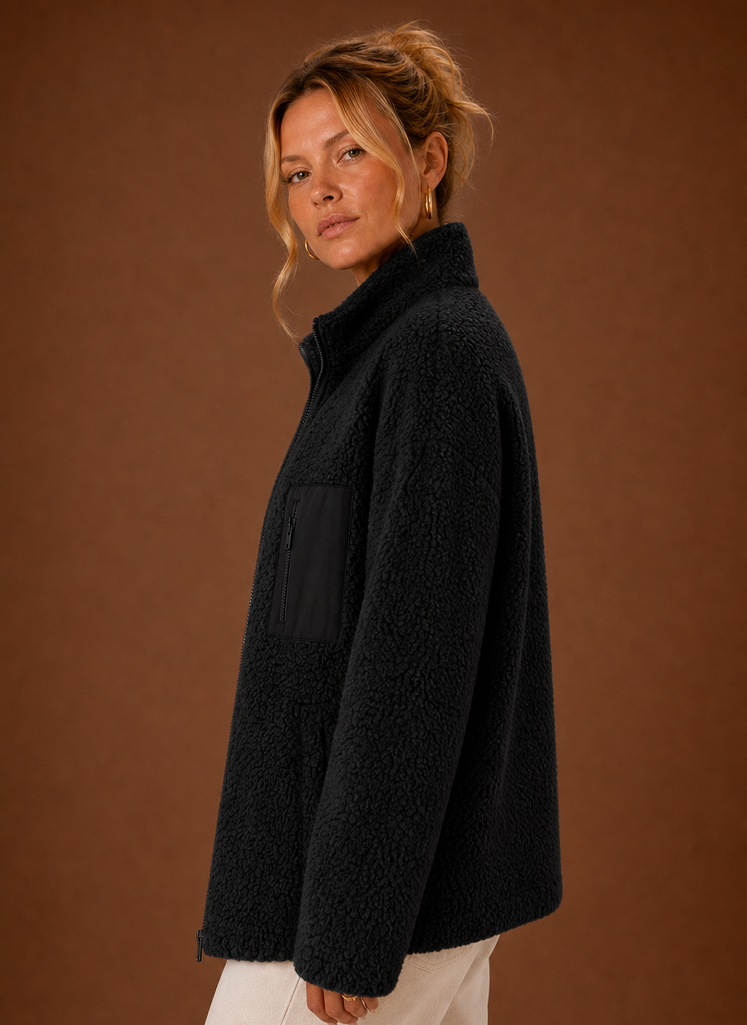 Side profile of Sherpa Zip-Up Jacket showing relaxed silhouette