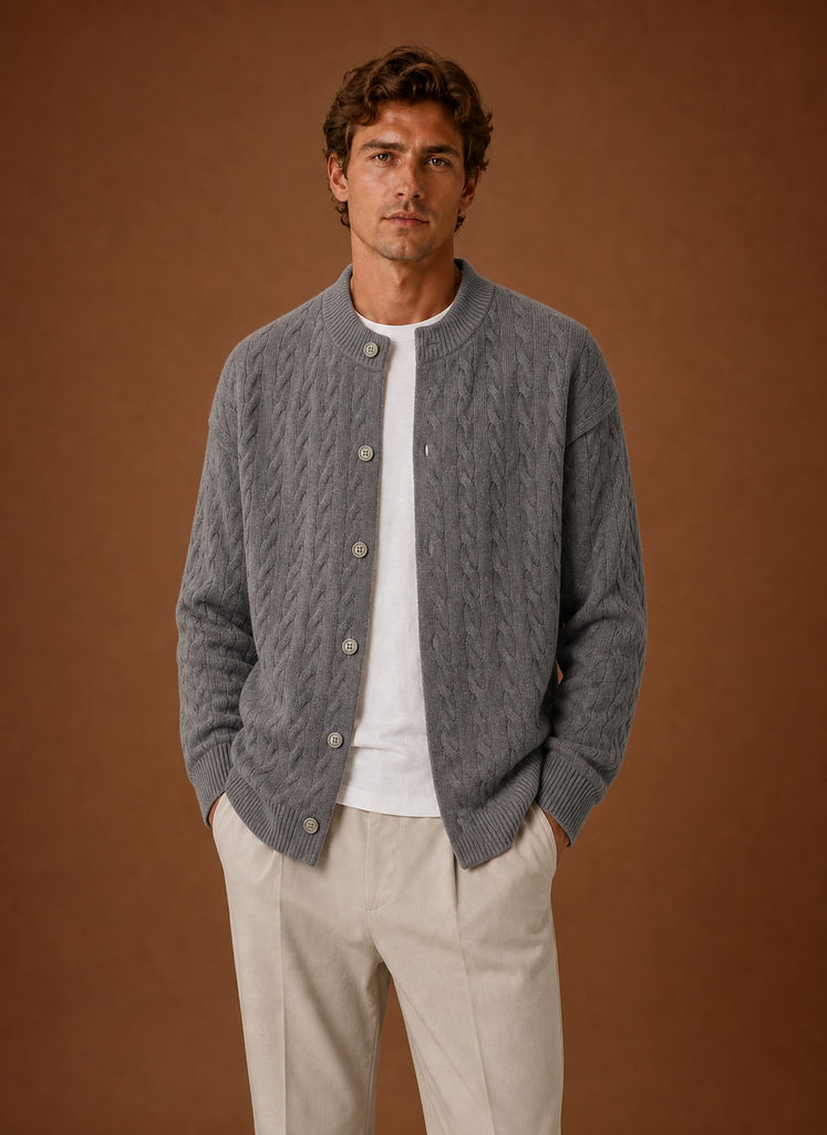 Front view of men's cable knit cardigan with button-front closure on a mannequin