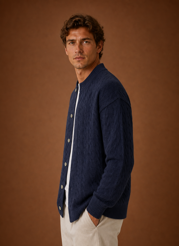 Side profile of men's cable knit cardigan showing long sleeve silhouette