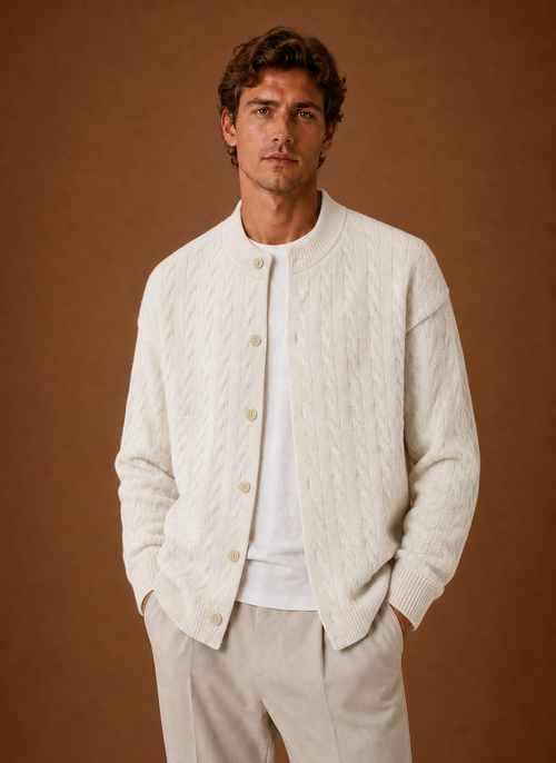 Front view of men's cable knit cardigan with button-front closure on a mannequin